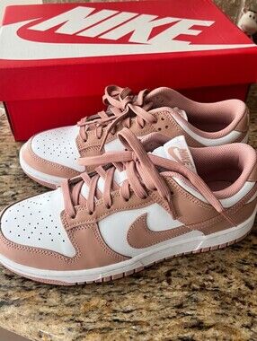 Nike Women’s Dunk Low in Light Pink and White